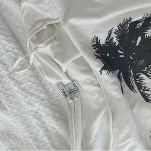 White T-Shirt with Black Palm Tree Design